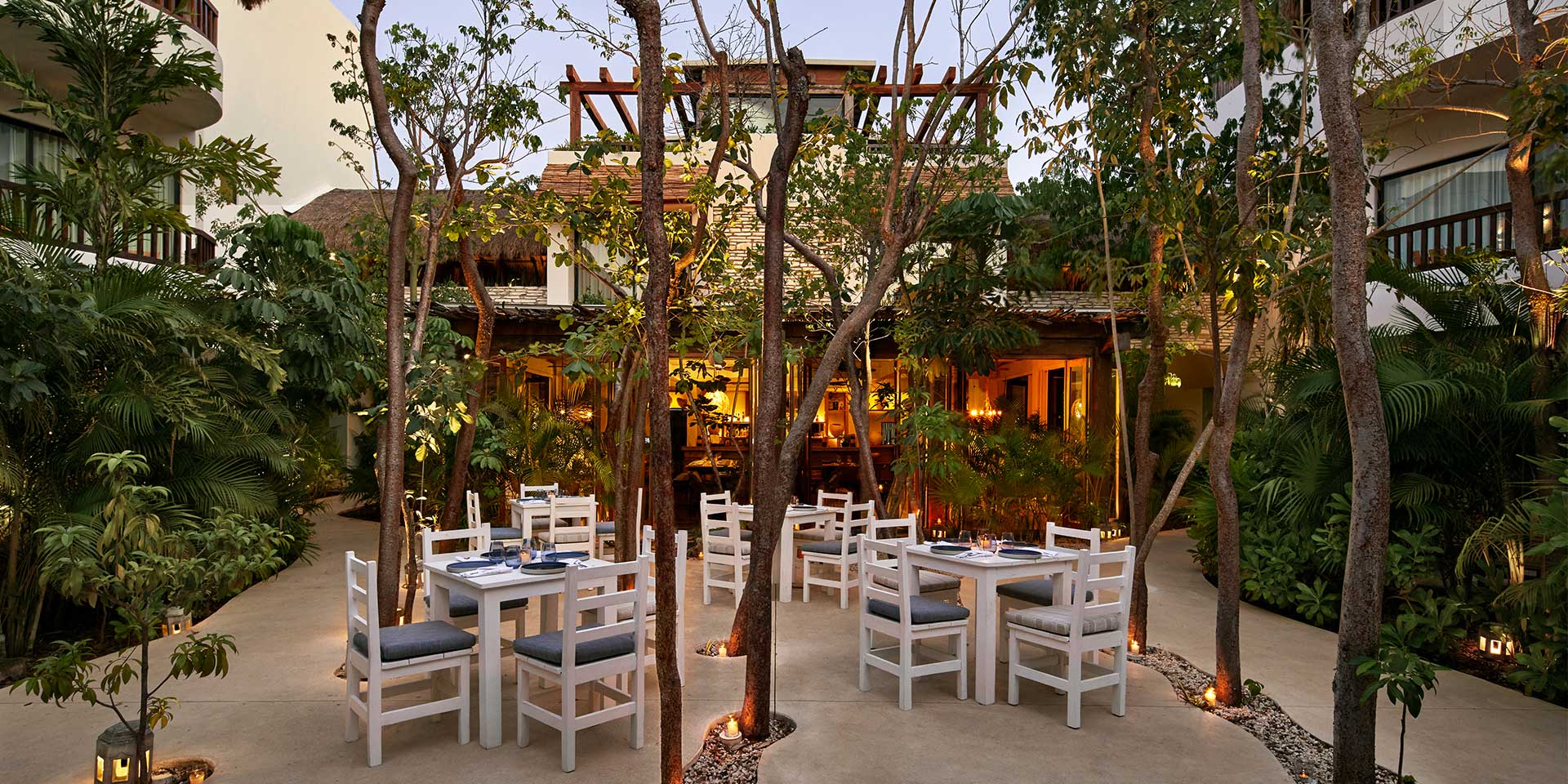 Enjoy a diner at this restaurant in the rooftop of a Tulum hotel